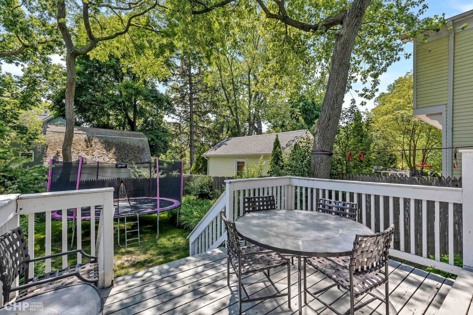 936 Spruce Street Winnetka, IL 60093 - Photo 22 of 38 a view of a chair and table in the balcony