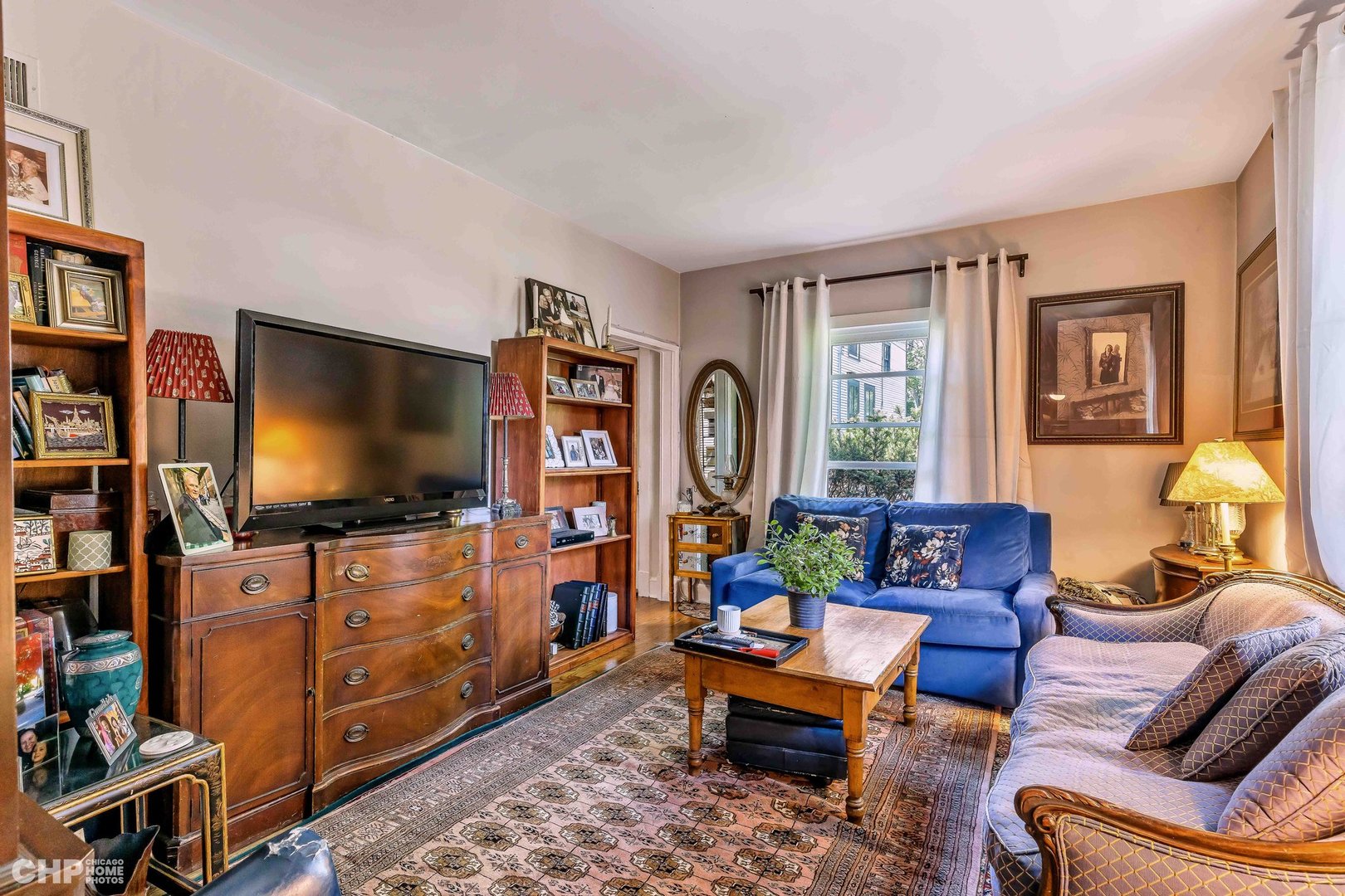 936 Spruce Street Winnetka, IL 60093 - Photo 32 of 38 a living room with furniture and a flat screen tv