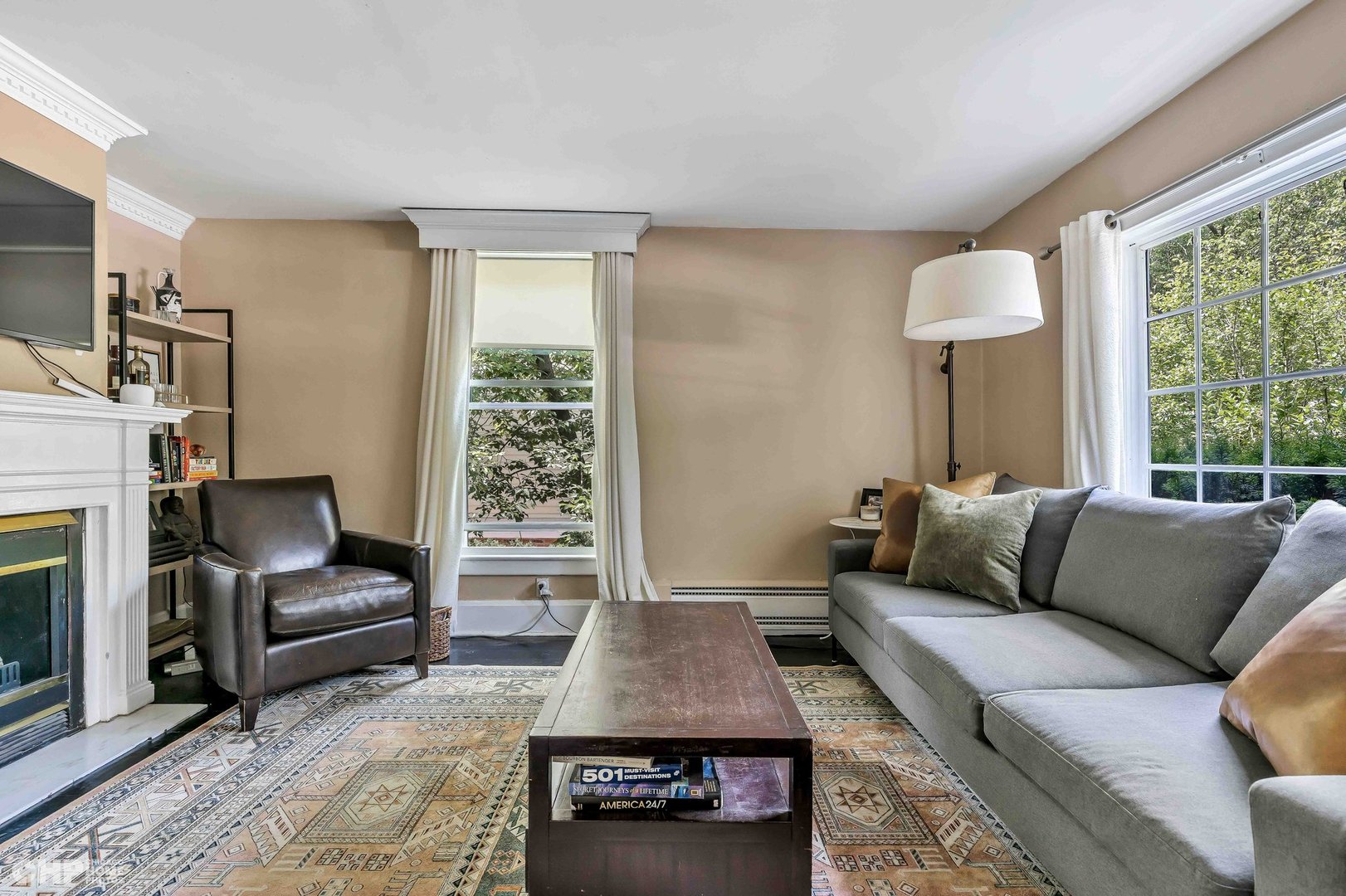 936 Spruce Street Winnetka, IL 60093 - Photo 4 of 38 a living room with furniture and a fireplace