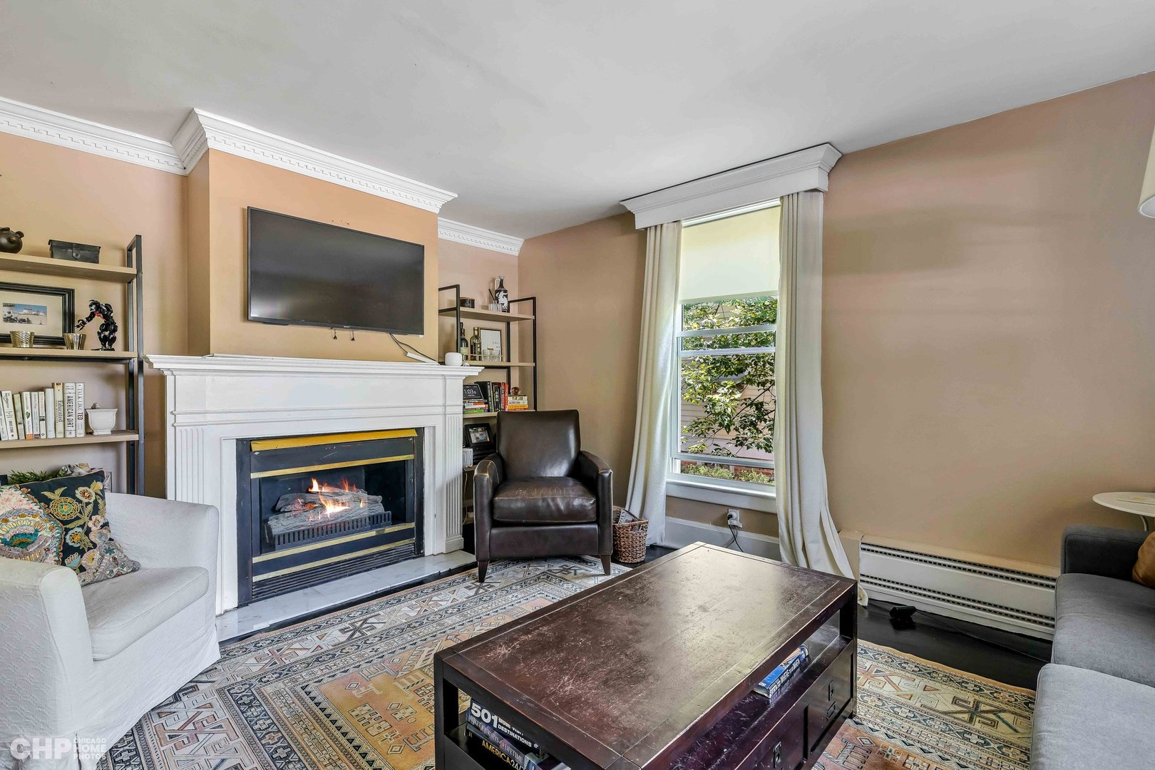 936 Spruce Street Winnetka, IL 60093 - Photo 5 of 38 a living room with furniture fireplace and flat screen tv