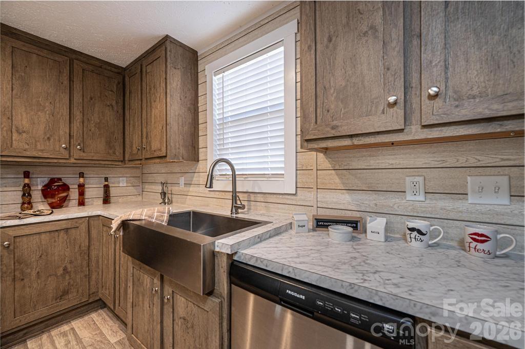 1070 Cottrell Hill Road Lenoir, NC 28645 - Photo 9 of 41 a kitchen with a sink and cabinets