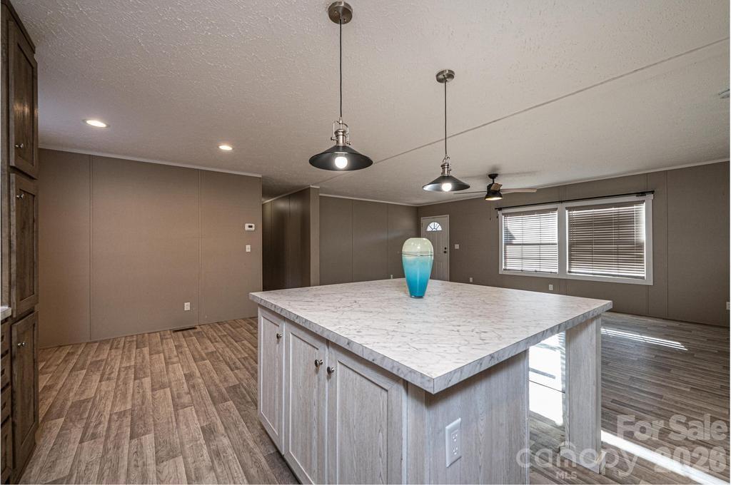 1070 Cottrell Hill Road Lenoir, NC 28645 - Photo 10 of 41 a kitchen with a sink a vanity and window