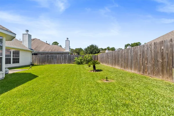 a house view with a garden space