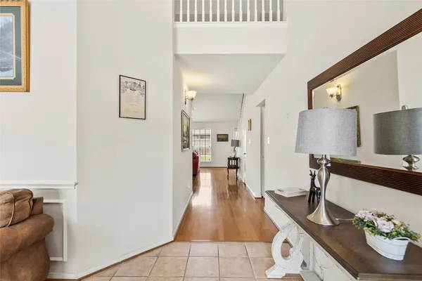 a view of a living room and dining room