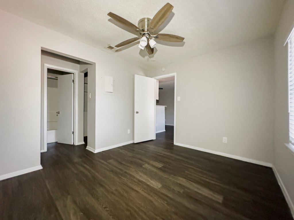4500 Witham Lane, Unit 104 Austin, TX 78745 - Photo 23 of 27 wooden floor in an empty room