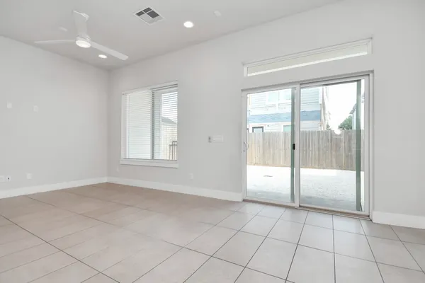 a view of an empty room and window