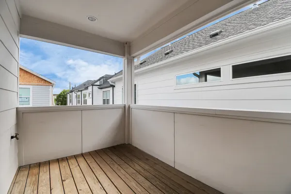 a spacious bathroom with a double vanity sink a mirror and a bathtub