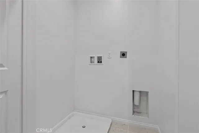 a bathroom with a double vanity sink mirror and shower