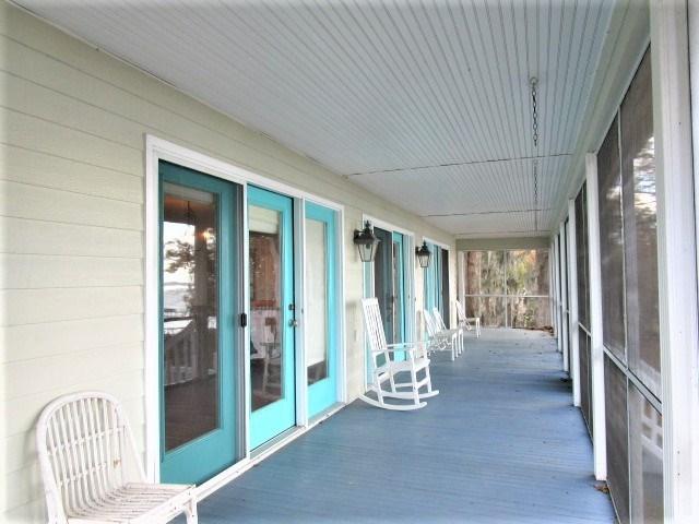 2584 Princess Pond Road Summerton, SC 29148 - Photo 4 of 31 Covered Porch Overlooking the Lake