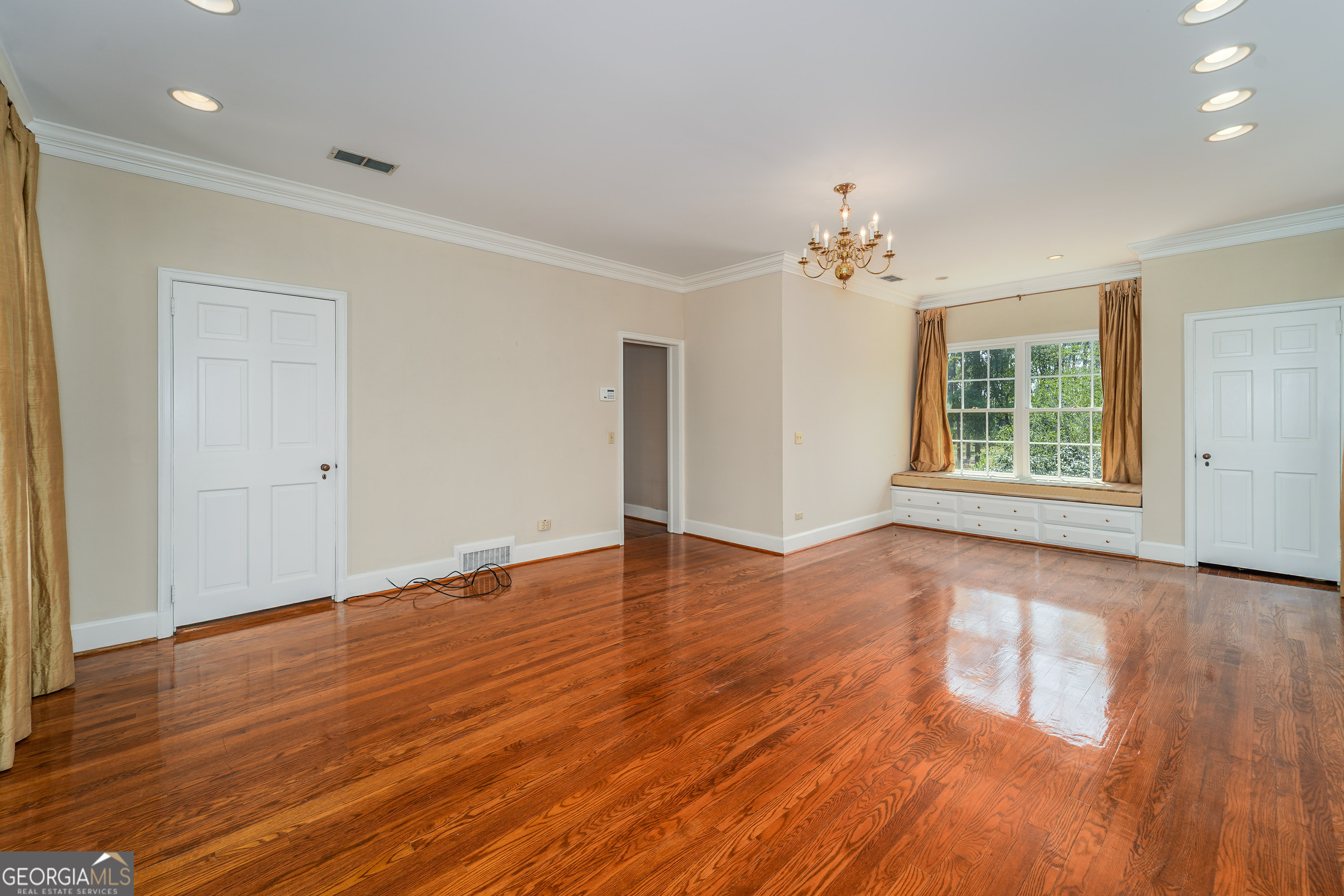 1602 Ward St Extension West Douglas, GA 31533 - Photo 51 of 70 a view of an empty room with wooden floor and a window