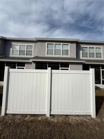 a view of house with deck