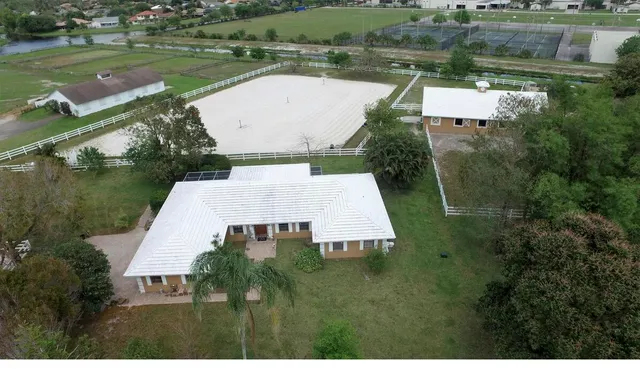 a view of a lake with a yard
