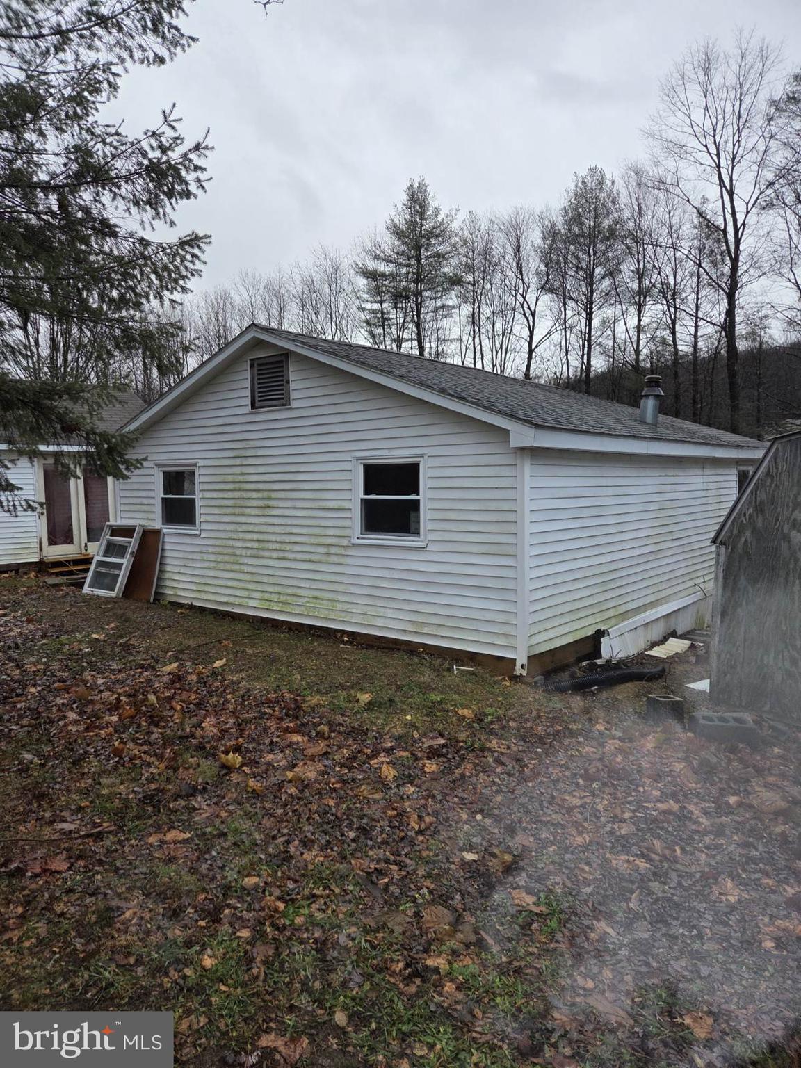 8012 Appleby Road Harrisburg, PA 17112 - Photo 22 of 32 a backyard of a house with lots of green space