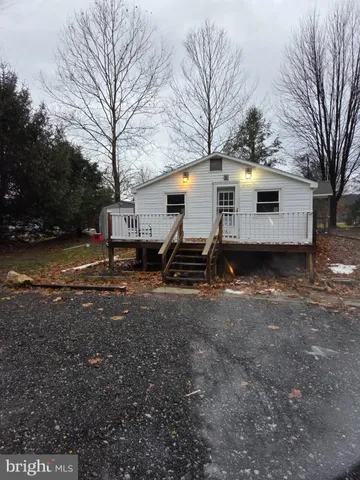 a house view with a backyard space