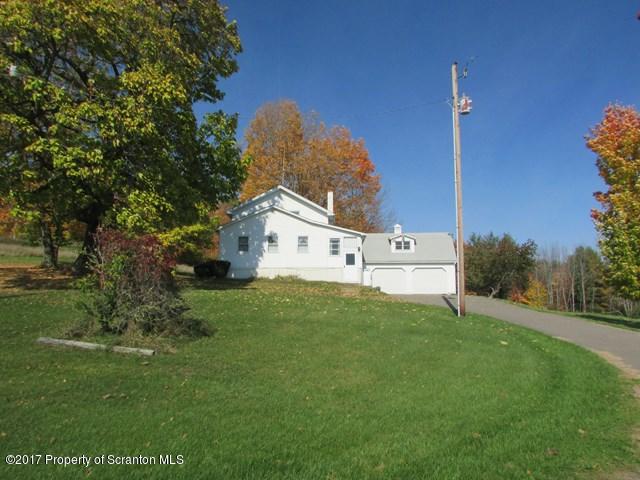 3948 Old Stage Coach Road Wyalusing, PA 18853 - Photo 17 of 19 a view of a house with a backyard