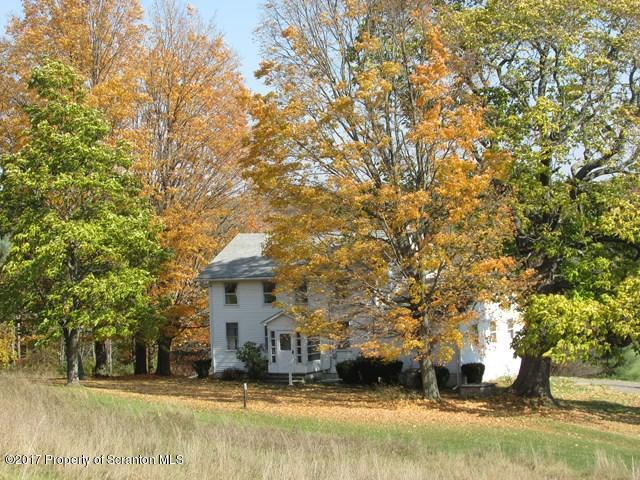 3948 Old Stage Coach Road Wyalusing, PA 18853 - Photo 2 of 19 a view of a house with a yard