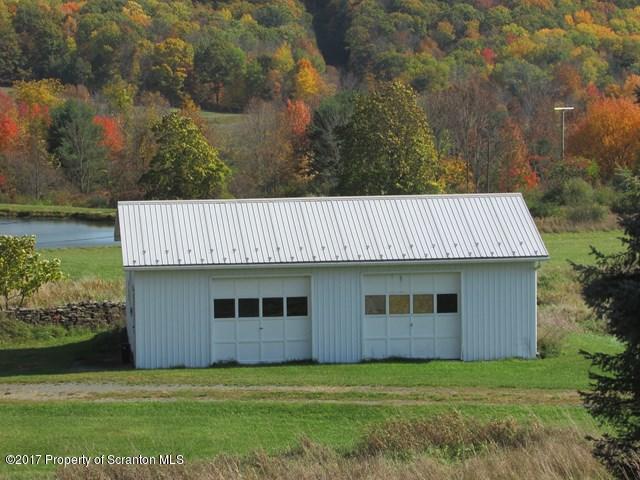 3948 Old Stage Coach Road Wyalusing, PA 18853 - Photo 3 of 19 a view of a house with a garden