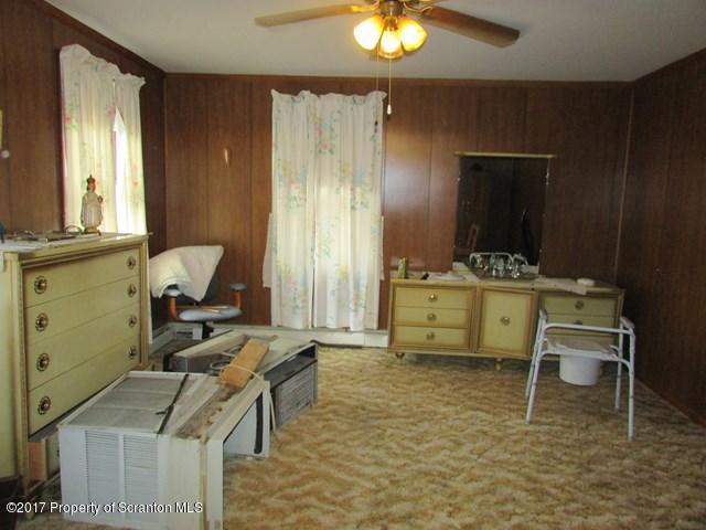 3948 Old Stage Coach Road Wyalusing, PA 18853 - Photo 9 of 19 a room with furniture and window
