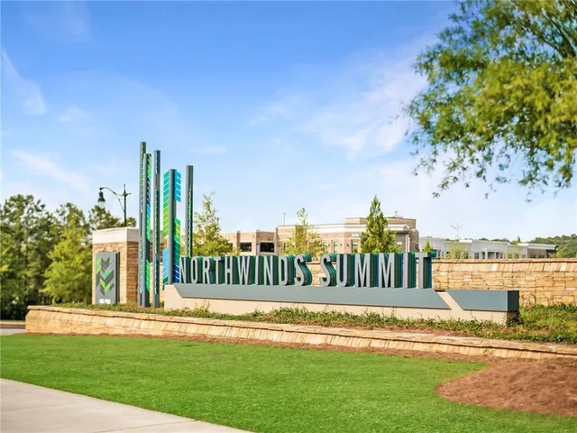 a view of swimming pool with a yard