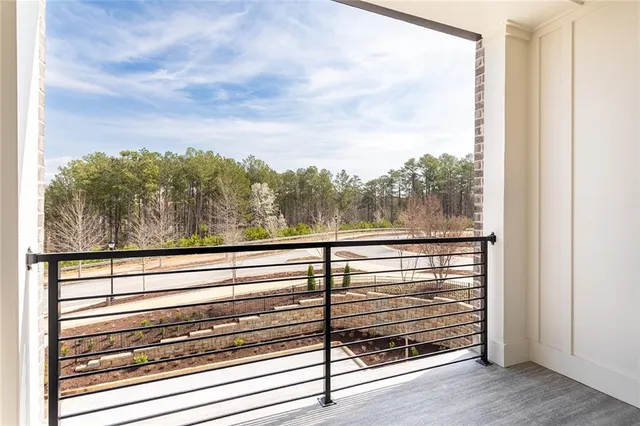 a view of a room next to a yard