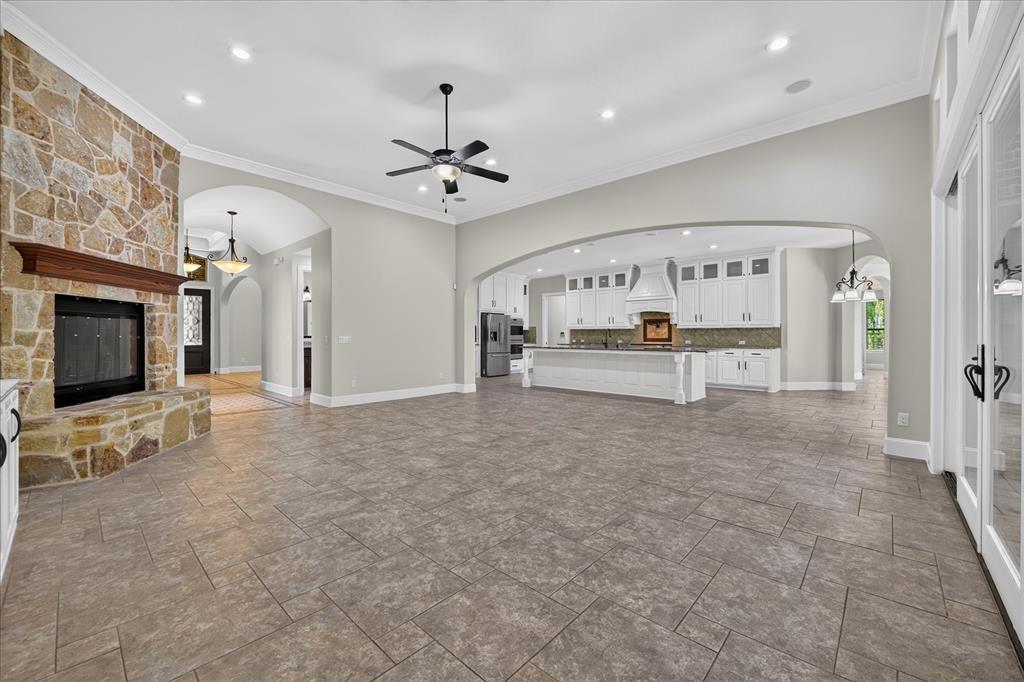 861 Hayden Road Lantana, TX 76226 - Photo 11 of 40 It has what is expected out of a luxury custom home including 8 ft solid core doors, floor-to-ceiling stone fireplace, and custom cabinetry.