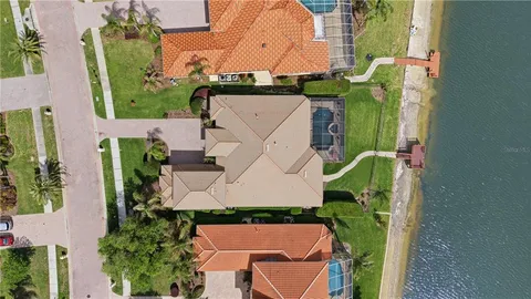 a bathroom with a bathtub sink and mirror