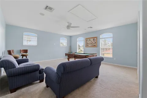 a view of a patio with a table chairs and a table