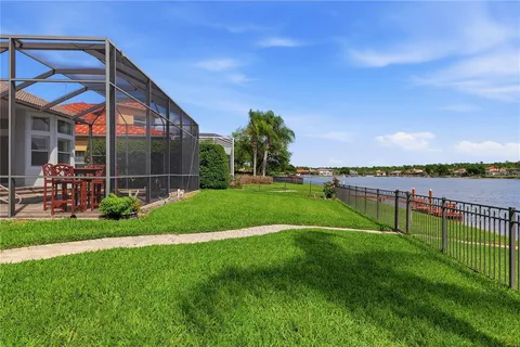a view of a lake with a bridge and a ocean view