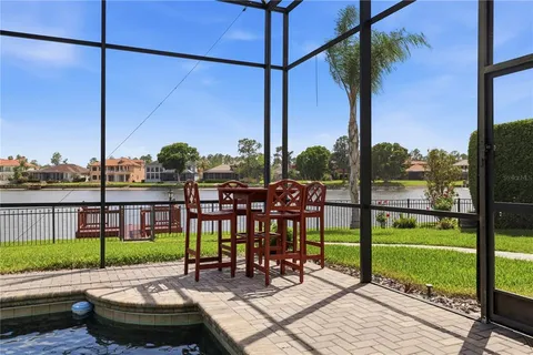 an aerial view of a house having swimming pool
