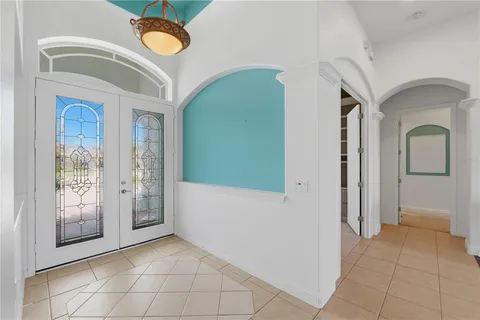 a kitchen with stainless steel appliances granite countertop a stove top oven a sink dishwasher and cabinets