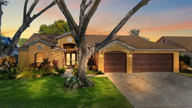 front view of a house with a yard