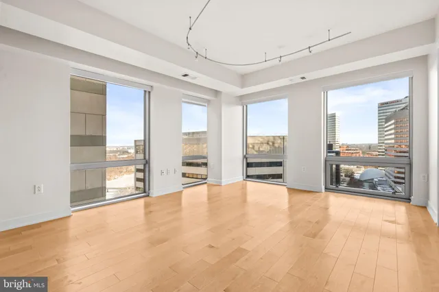 a view of an empty room with a window