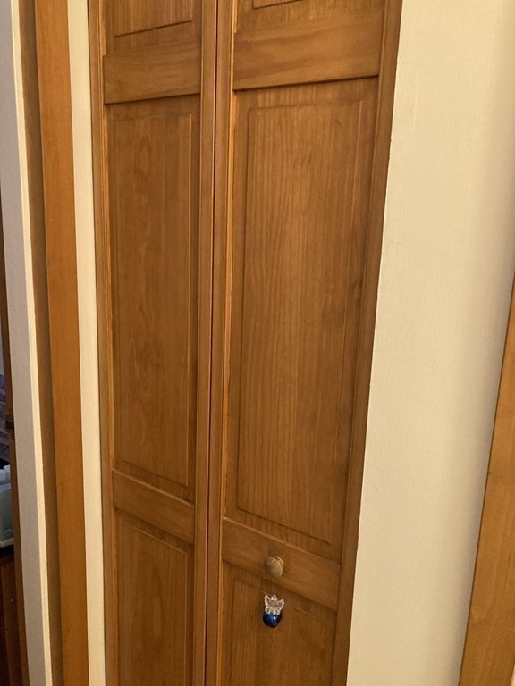 1 Summit Drive, Unit 26 Reading, MA 01867 - Photo 17 of 26 a bathroom with a shower curtain