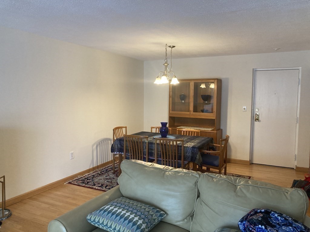 1 Summit Drive, Unit 26 Reading, MA 01867 - Photo 6 of 26 a living room with furniture