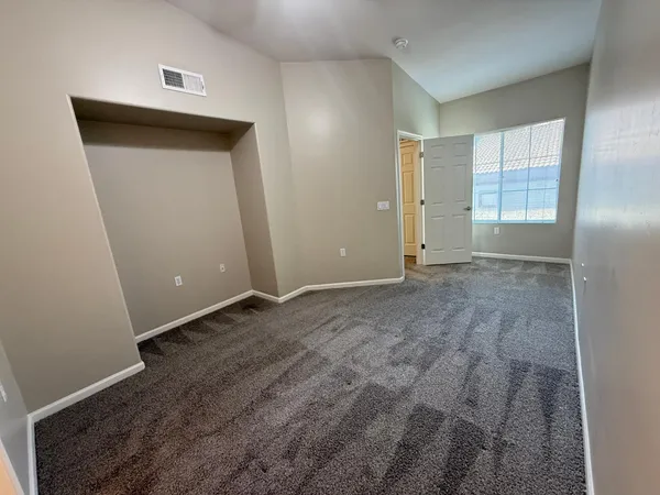 an empty room with windows