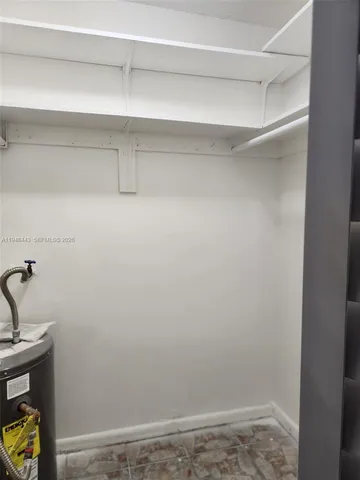 a bathroom with a toilet and a sink