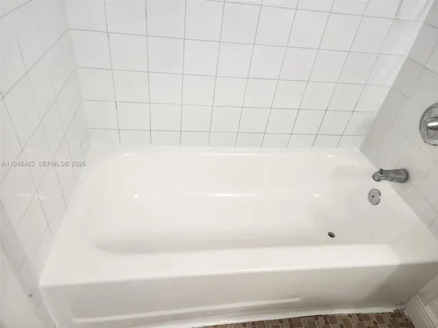 a bathroom with a bathtub