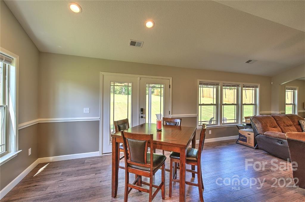 233 Sunward Path Inman, SC 29349 - Photo 30 of 48 a view of a livingroom with furniture window and wooden floor