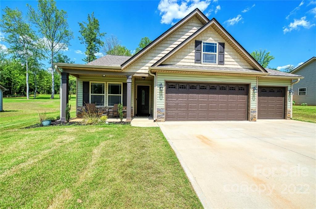 233 Sunward Path Inman, SC 29349 - Photo 3 of 48 a front view of a house with a yard