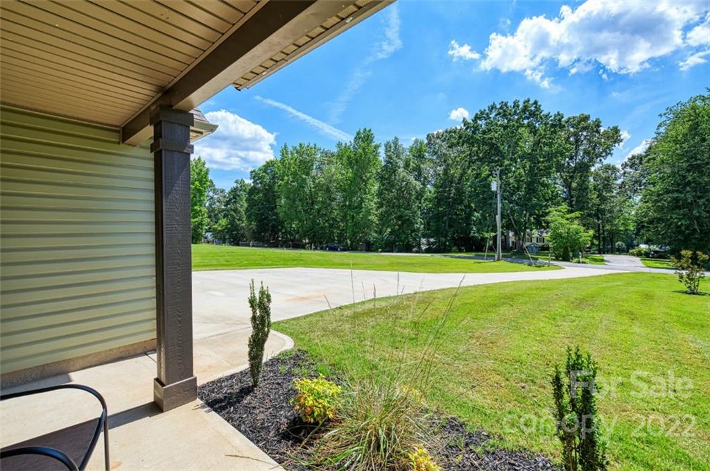 233 Sunward Path Inman, SC 29349 - Photo 7 of 48 a view of a swimming pool with a yard