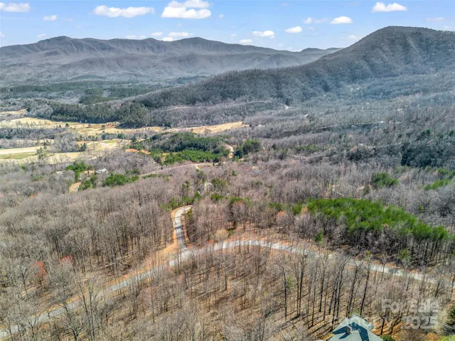 a view of mountain view with mountains in the background