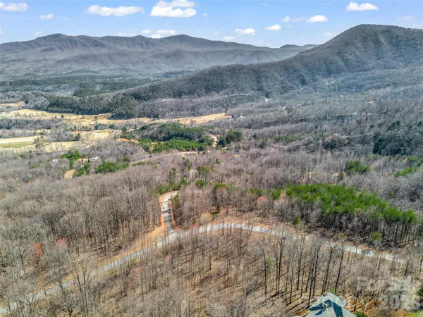 a view of a yard next to a building