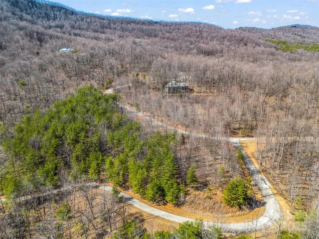 a view of a lake with mountains in the background