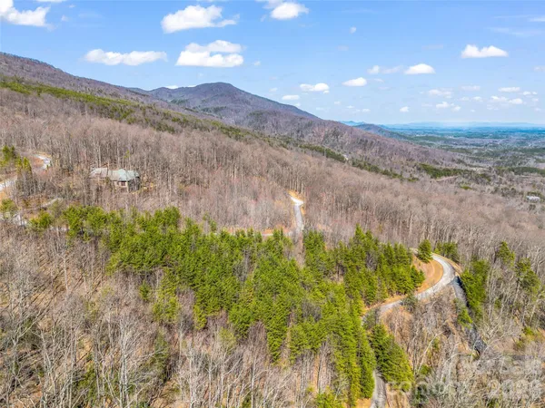a view of a lake in middle of the town