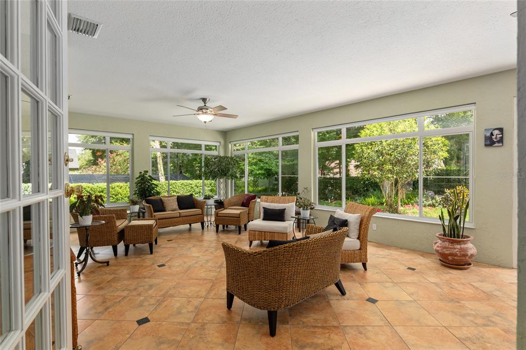 2215 Spring Hill Court Ocala, FL 34471 - Photo 43 of 62 a living room with furniture and garden view