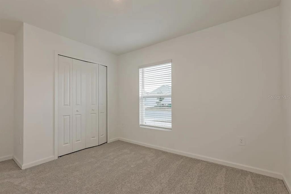 1449 Austin Street Lake Wales, FL 33859 - Photo 11 of 18 an empty room with windows