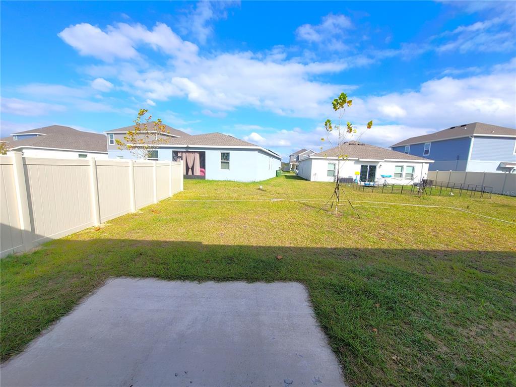 1449 Austin Street Lake Wales, FL 33859 - Photo 15 of 18 a view of a house with a yard