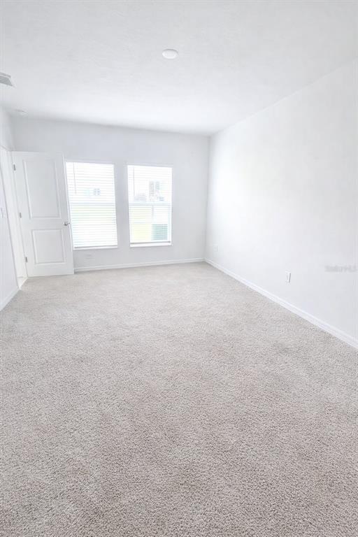 1449 Austin Street Lake Wales, FL 33859 - Photo 7 of 18 an empty room with a window