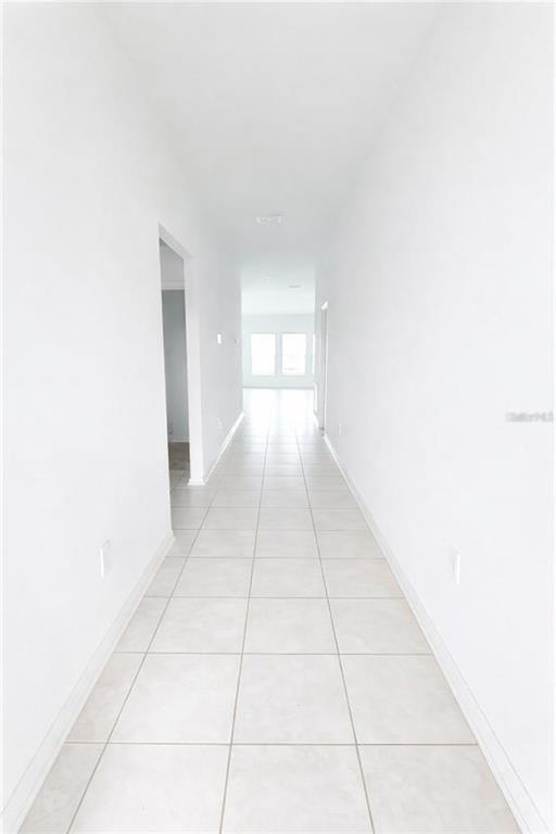 1449 Austin Street Lake Wales, FL 33859 - Photo 10 of 18 a view of an empty room and window