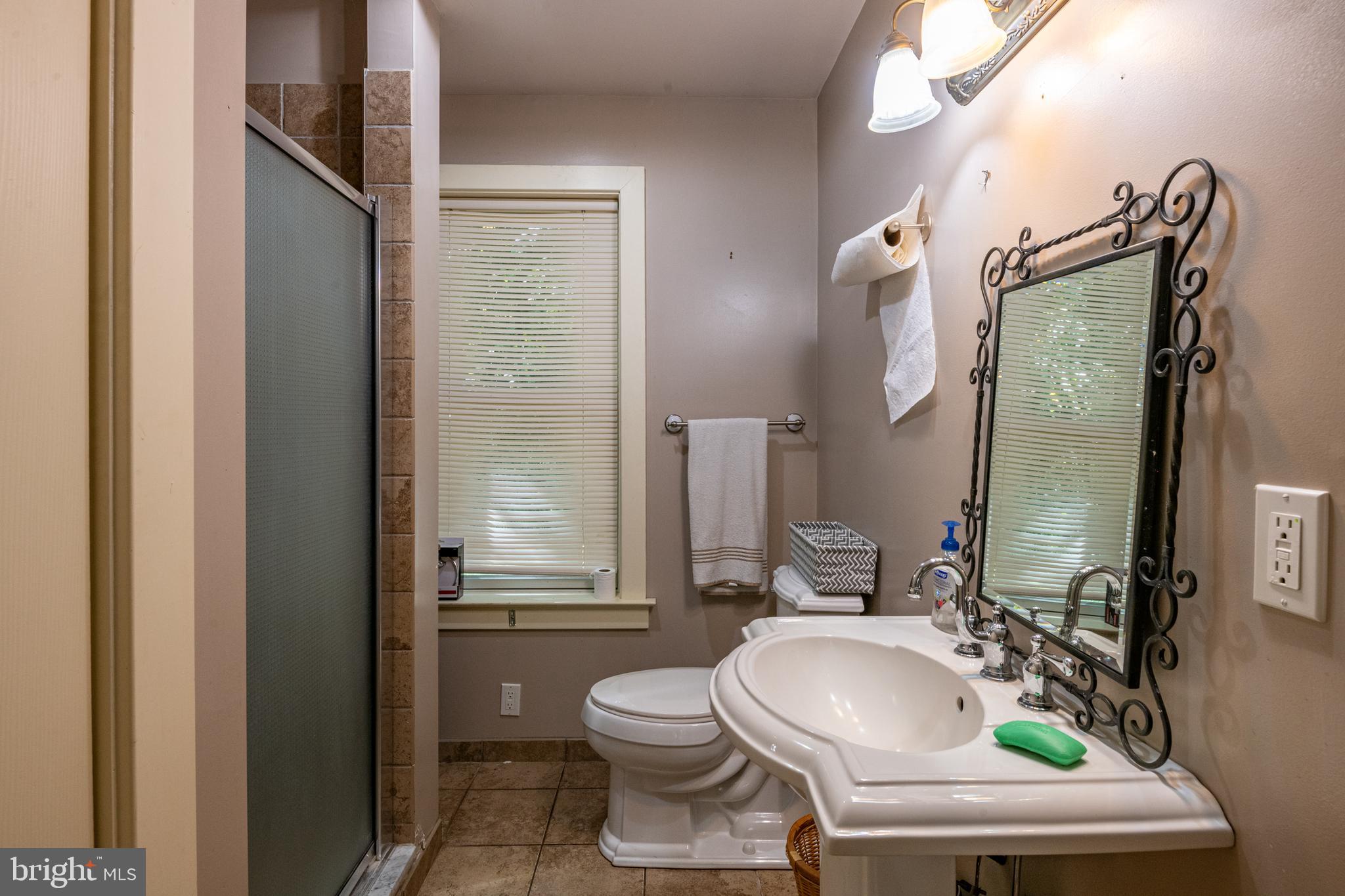 700 Fabers Road Reading, PA 19606 - Photo 17 of 33 a bathroom with a sink toilet and shower